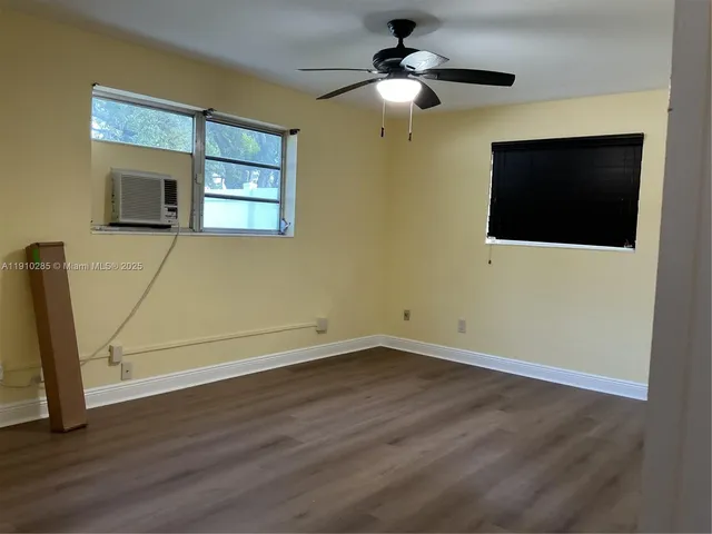 a view of a livingroom with a flat screen tv