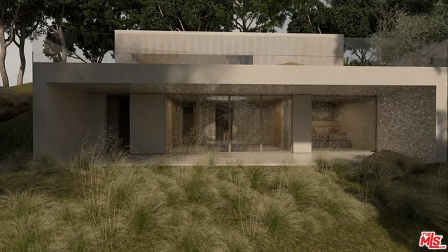 a view of a house with backyard and trees