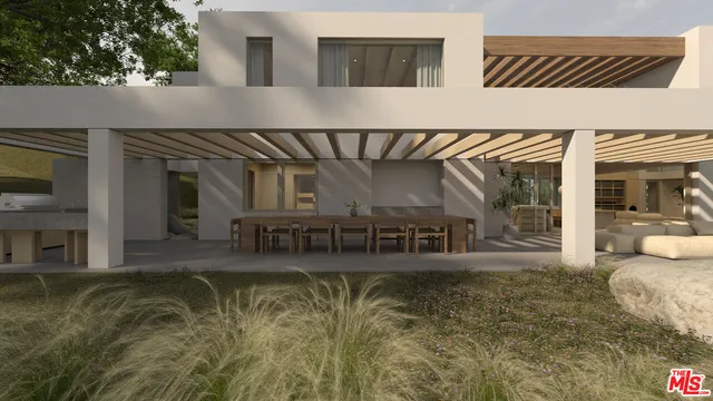 a view of a swimming pool with outdoor seating