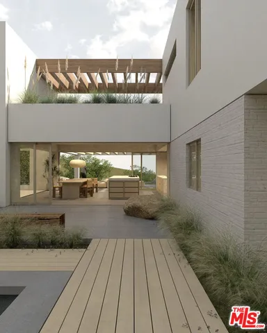 a view of swimming pool with seating space