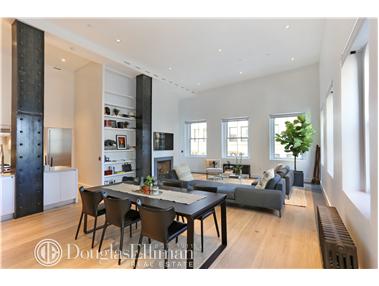 65 Leonard Street, Unit PH Manhattan, NY 10013 - Photo 1 of 1 a living room with furniture and a table