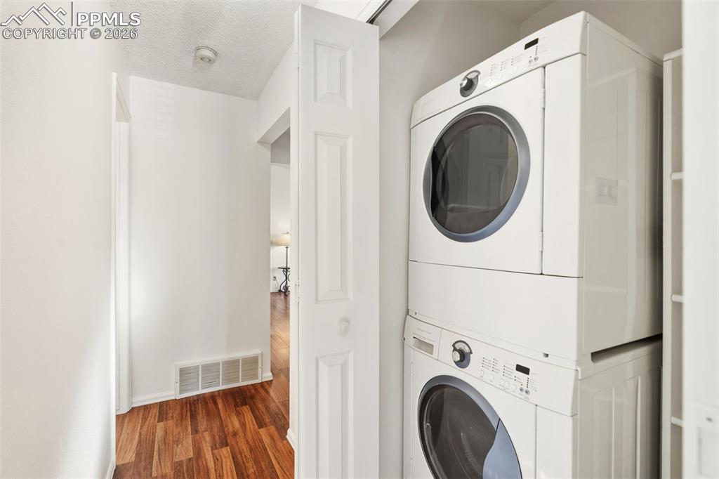 918 Tenderfoot Hill Road, Unit 202 Colorado Springs, CO 80906 - Photo 22 of 48 a utility room with dryer and washer