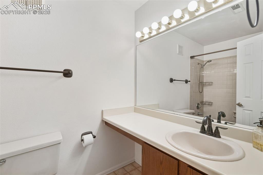 918 Tenderfoot Hill Road, Unit 202 Colorado Springs, CO 80906 - Photo 27 of 48 a bathroom with a sink and a mirror