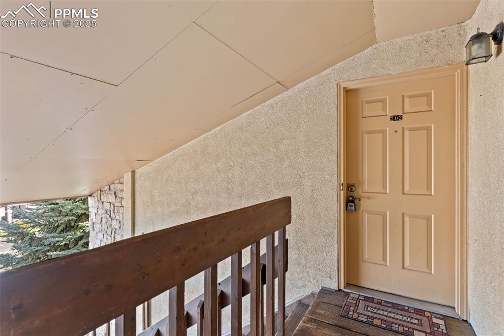 918 Tenderfoot Hill Road, Unit 202 Colorado Springs, CO 80906 - Photo 3 of 48 a view of wooden floor