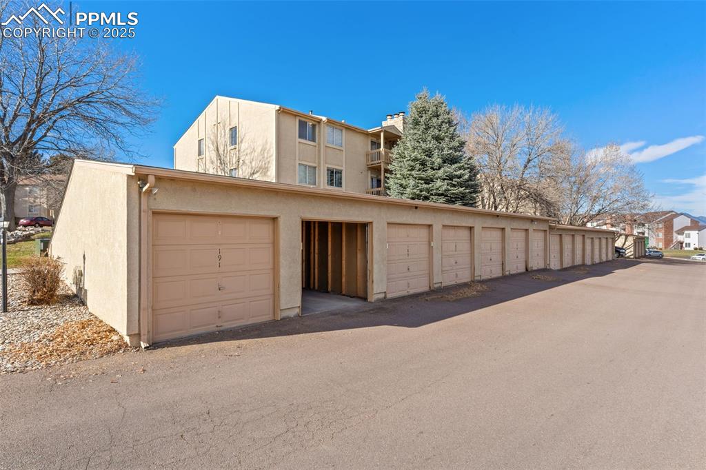 918 Tenderfoot Hill Road, Unit 202 Colorado Springs, CO 80906 - Photo 41 of 48 a view of a house with a roof yard