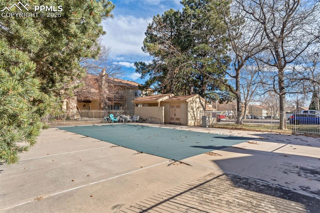 918 Tenderfoot Hill Road, Unit 202 Colorado Springs, CO 80906 - Photo 47 of 48 a view of road with large trees