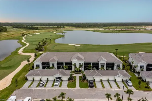 a aerial view of a house with a ocean view