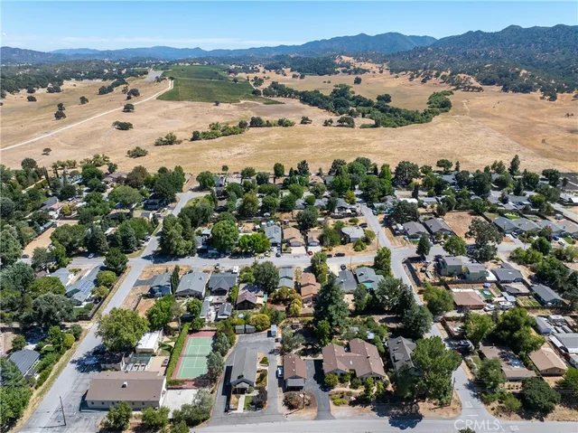 a view of a backyard of the house
