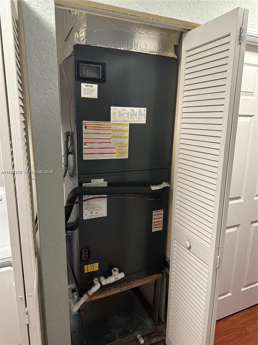 9891 Northwest 24th Street Sunrise, FL 33322 - Photo 7 of 8 a bathroom with a sink and toilet