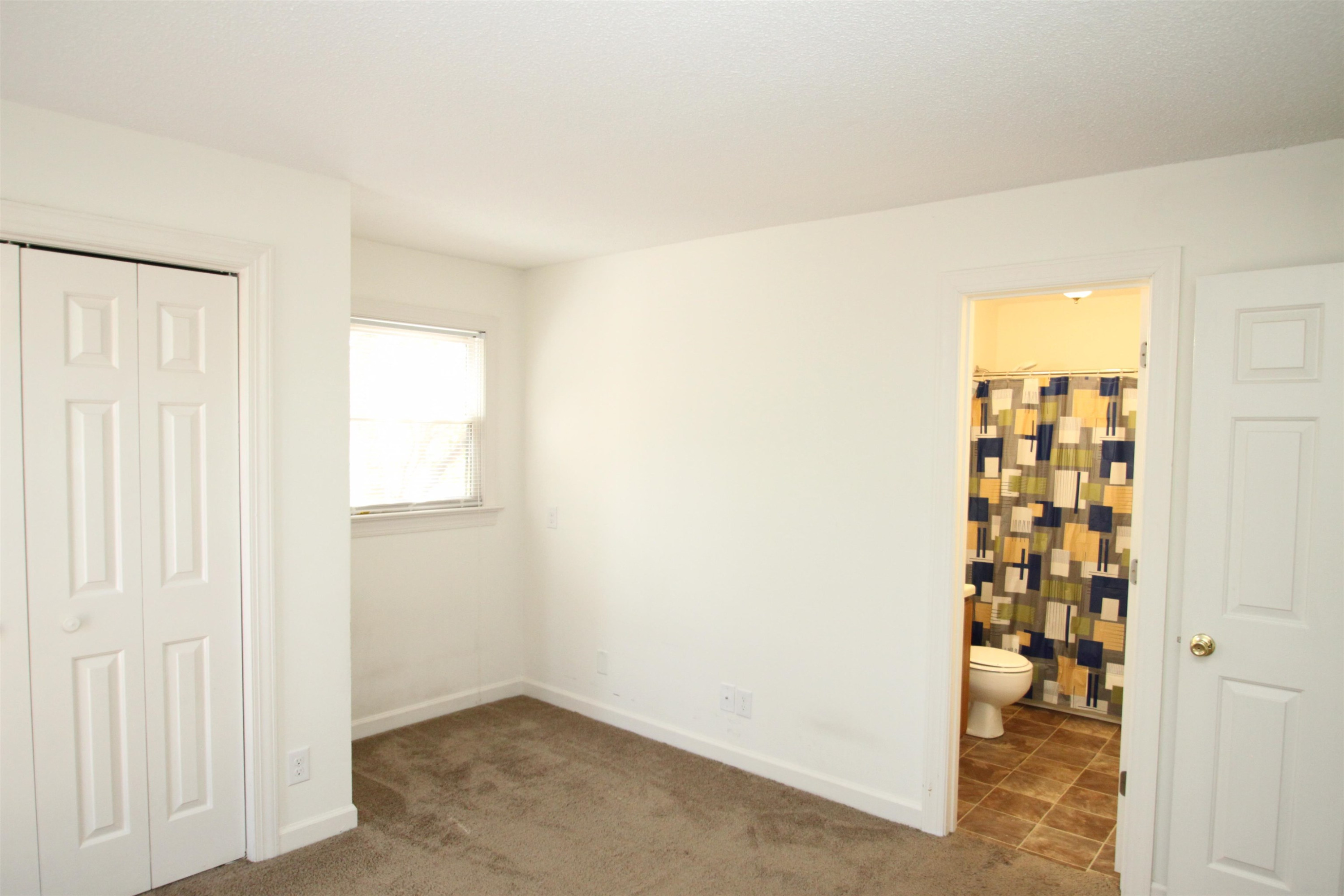 3537 Ivy Commons Drive, Unit 202 Raleigh, NC 27606 - Photo 24 of 51 Back Bedroom