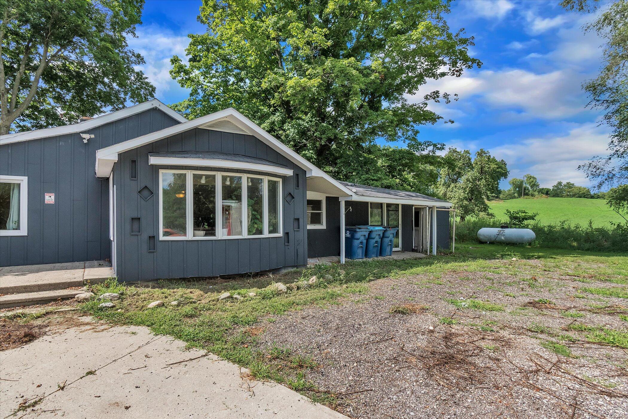 5226 Dumon Road Belding, MI 48809 - Photo 4 of 34 04-5226-Dumon-Road-WindowStill-Real-Esta
