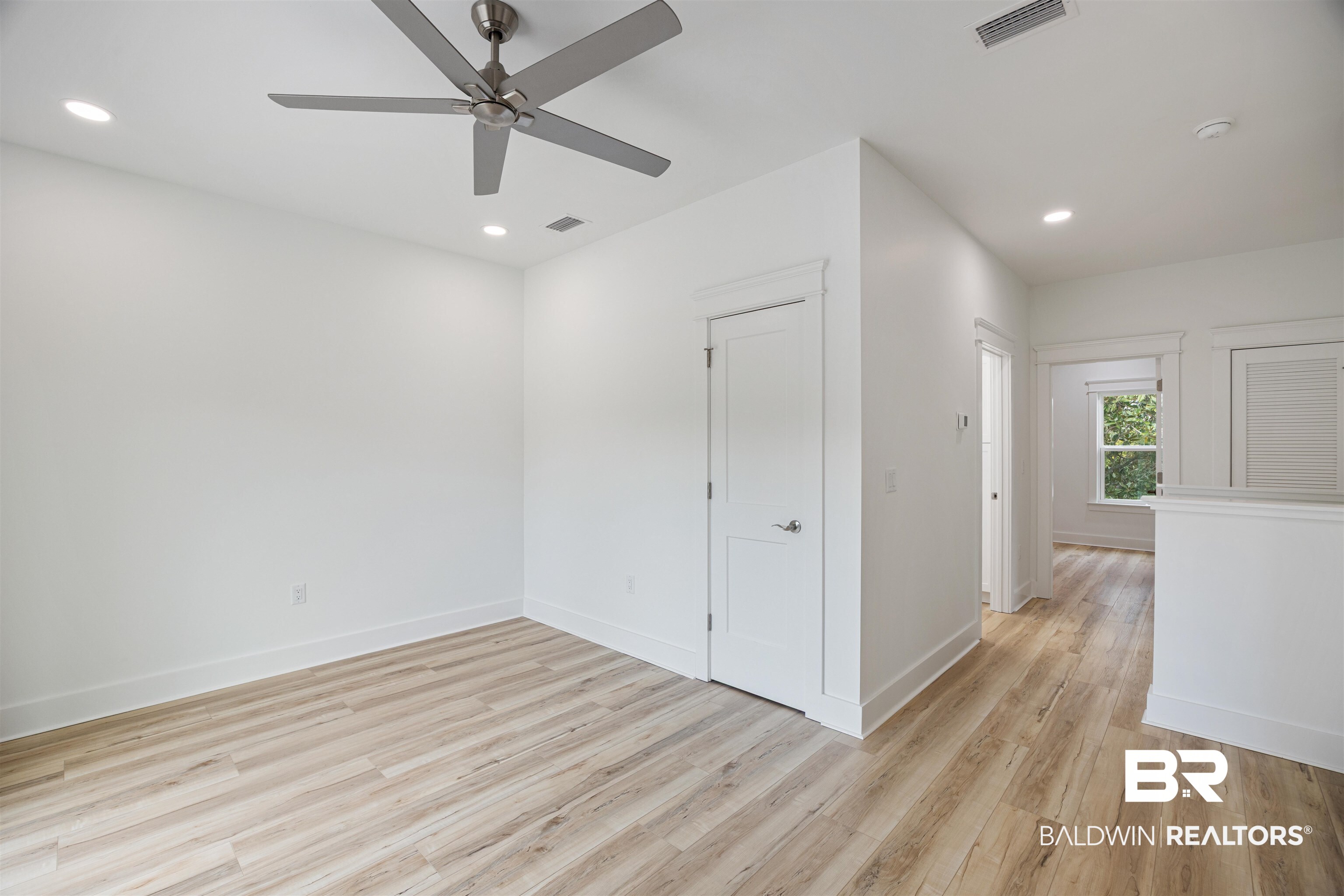 27591 Canal Road Orange Beach, AL 36561 - Photo 44 of 51 Spare room featuring light wood-style floors, recessed lighting, and ceiling fan