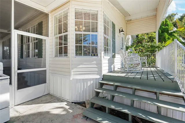 a view of a house with a door and a window