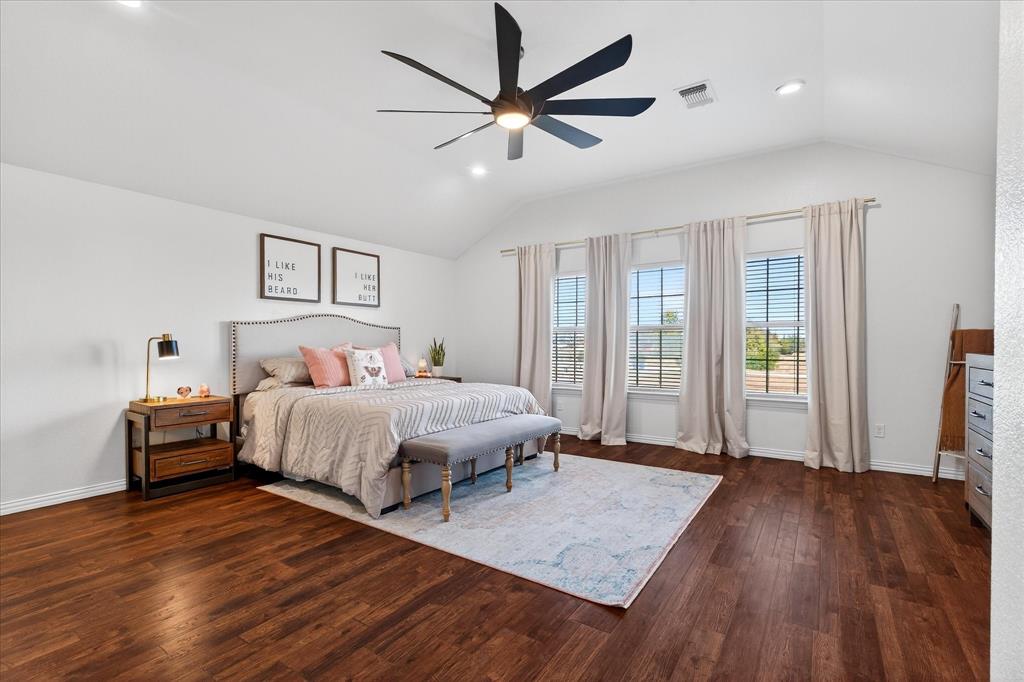 7675 Michael Road Sanger, TX 76266 - Photo 23 of 40 a bedroom with a bed and window