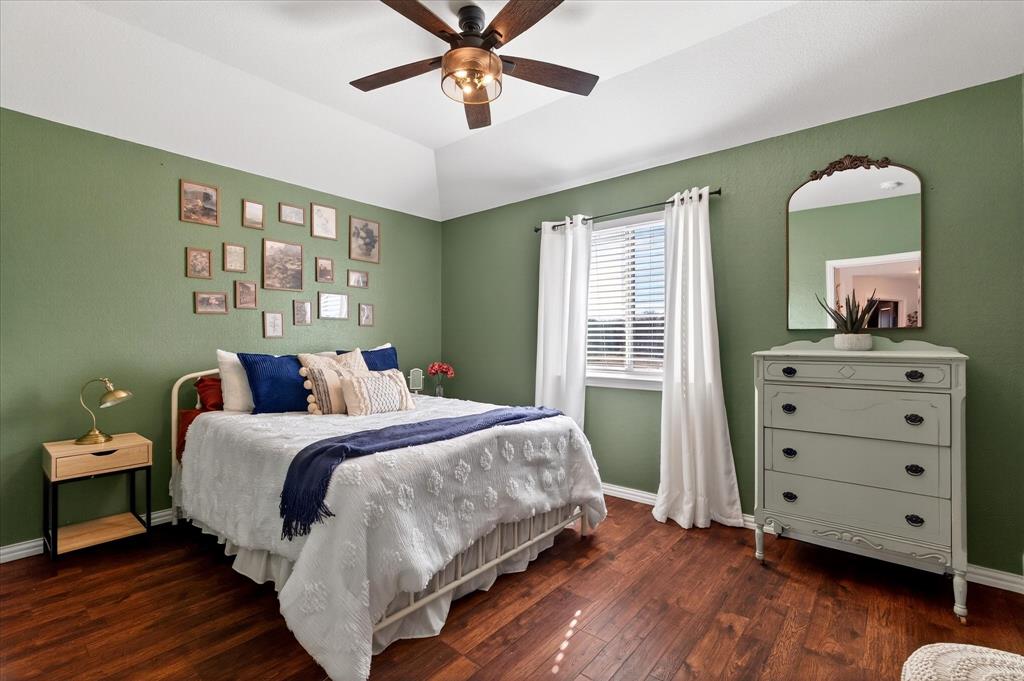 7675 Michael Road Sanger, TX 76266 - Photo 27 of 40 a bed room with a bed and a mirror