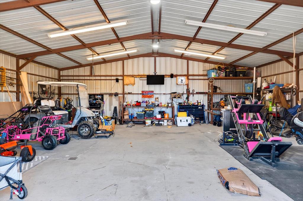 7675 Michael Road Sanger, TX 76266 - Photo 36 of 40 a view of a storage area with a garage