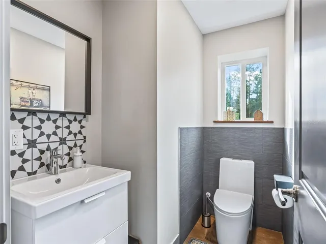 a view of entryway and hall with dining room