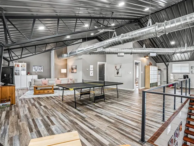 a bedroom with furniture and a bed