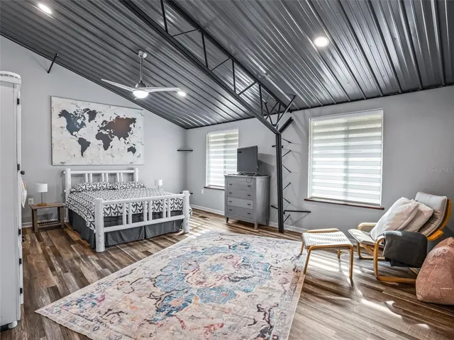 a view of a patio with chairs and a table