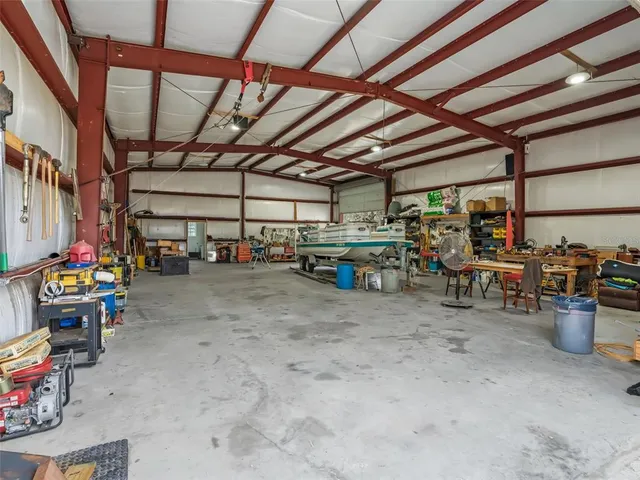 a view of a storage room with racks