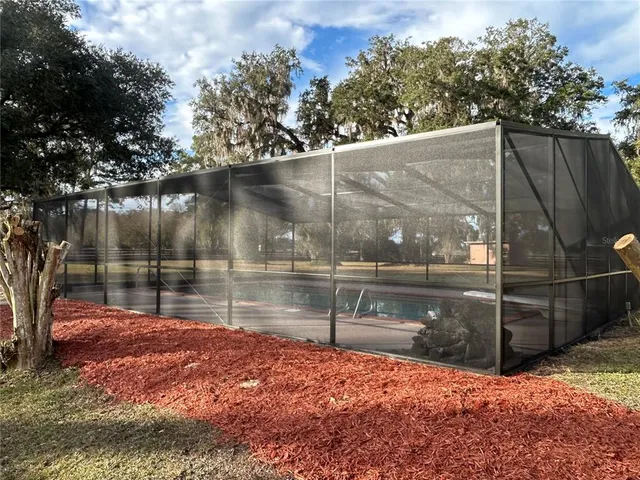 a view of backyard with green space