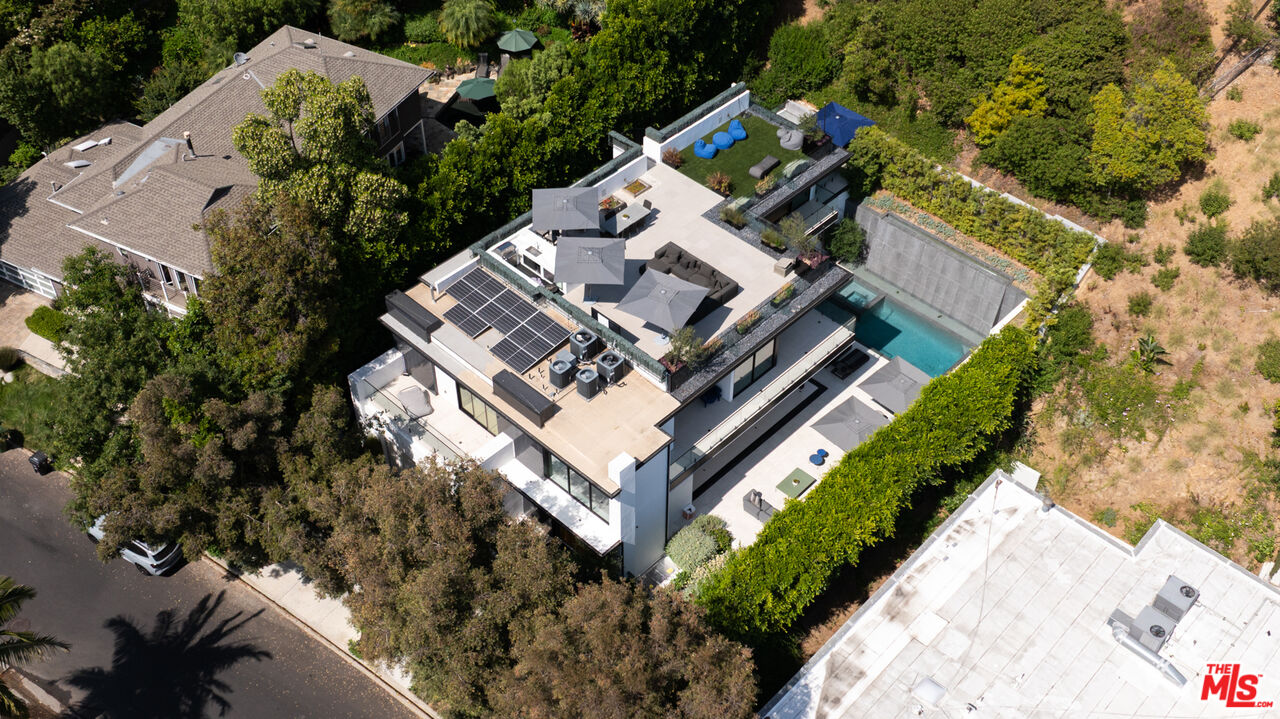 1488 Rising Glen Road Los Angeles, CA 90069 - Photo 31 of 37 a view of a house with a yard and garden