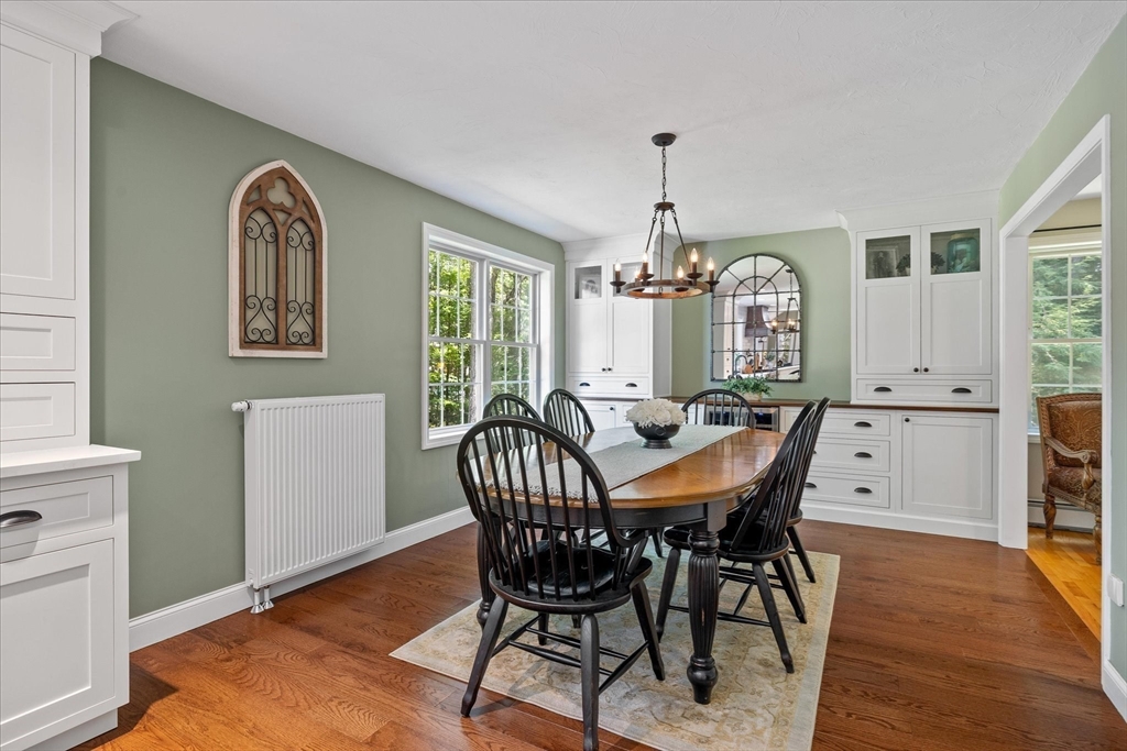 232 Sherbert Road Ashburnham, MA 01430 - Photo 11 of 42 a view of a dining room with furniture window and wooden floor