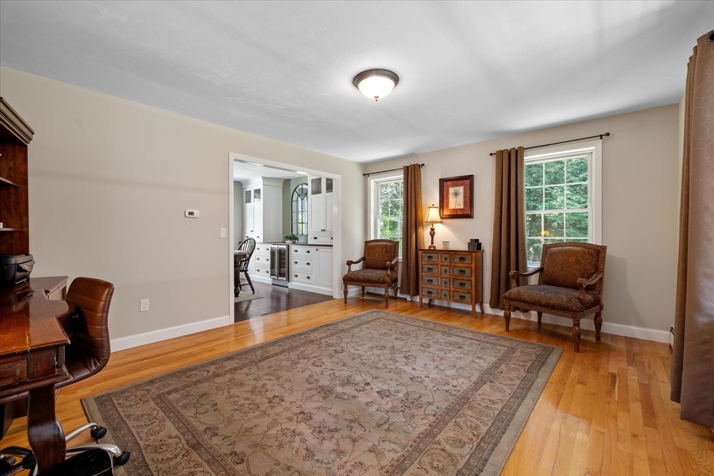 232 Sherbert Road Ashburnham, MA 01430 - Photo 16 of 42 a view of a livingroom with workspace and a window