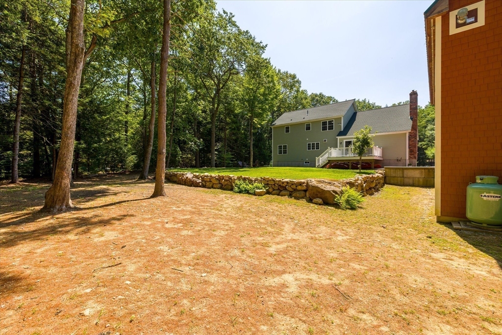 232 Sherbert Road Ashburnham, MA 01430 - Photo 36 of 42 a view of a house with a yard