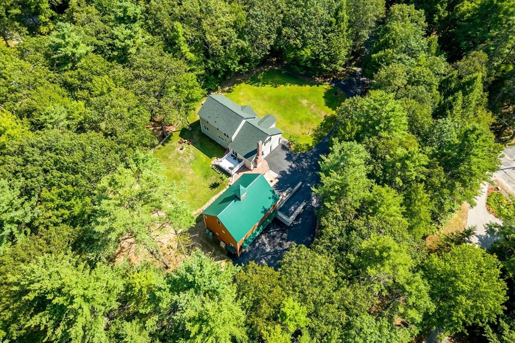 232 Sherbert Road Ashburnham, MA 01430 - Photo 38 of 42 an aerial view of a house with a yard and swimming pool
