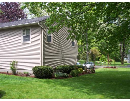 309 Mason Rd Extension Dudley, MA 01571 - Photo 13 of 13 a view of a house with a backyard
