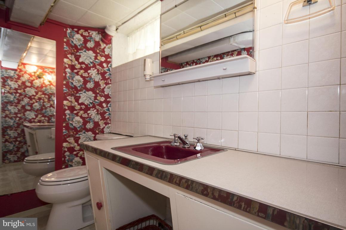 7818 Highpoint Road Baltimore, MD 21234 - Photo 27 of 30 Half bath in Lower level