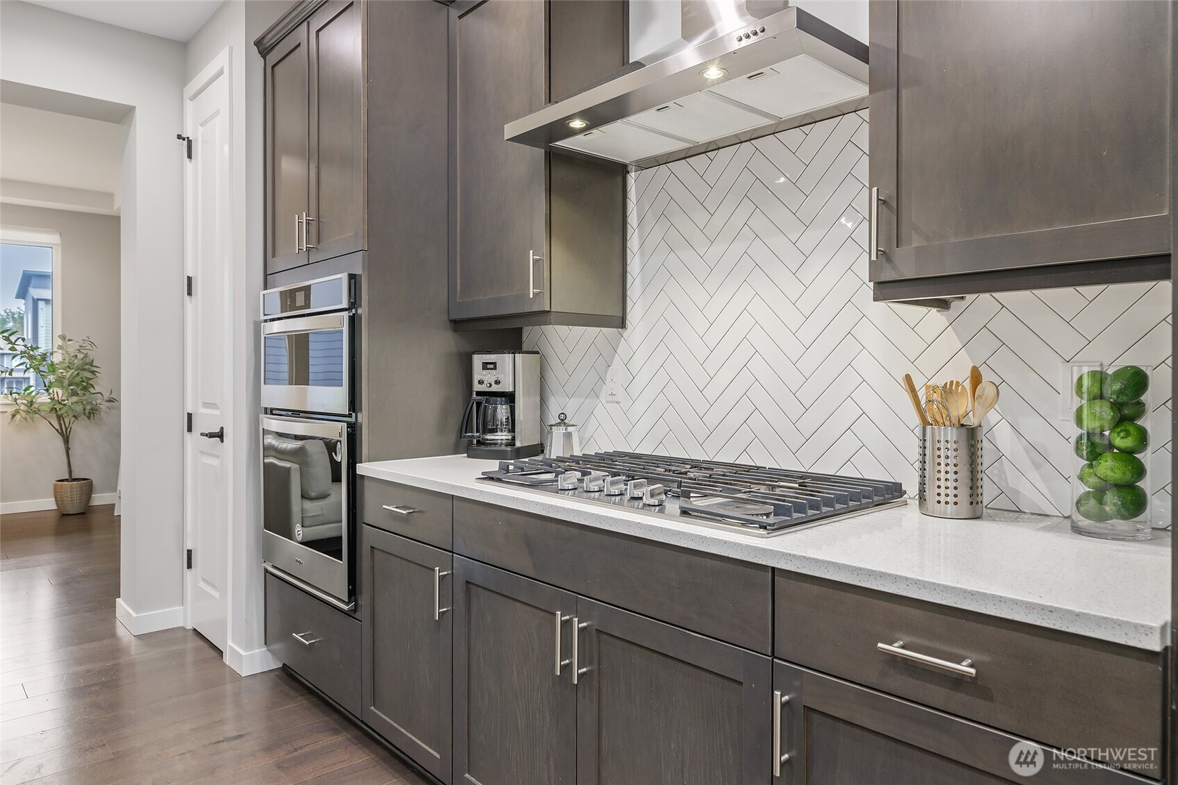 23630 6th Avenue Southeast, Unit B Bothell, WA 98021 - Photo 13 of 40 a kitchen with stainless steel appliances granite countertop a refrigerator and a stove