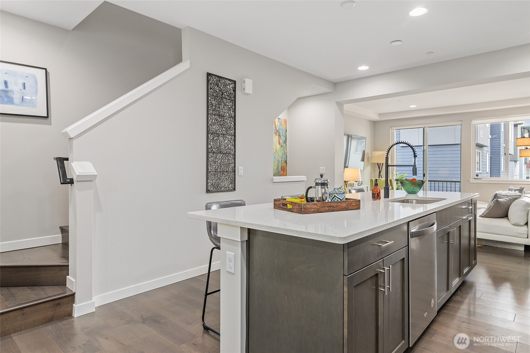 23630 6th Avenue Southeast, Unit B Bothell, WA 98021 - Photo 15 of 40 a kitchen with a sink cabinets and wooden floor