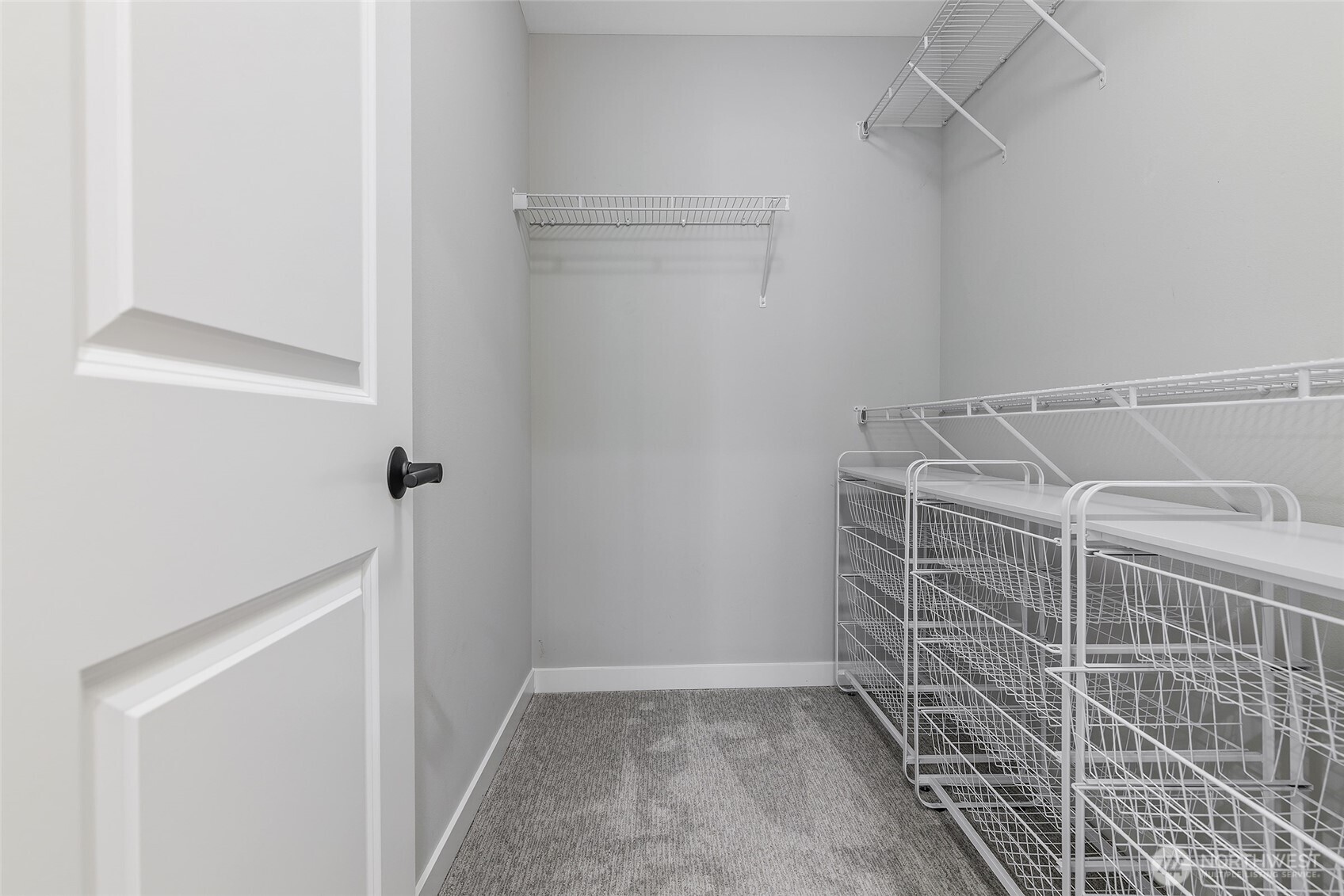 23630 6th Avenue Southeast, Unit B Bothell, WA 98021 - Photo 24 of 40 a view of storage and utility room with racks on the wall