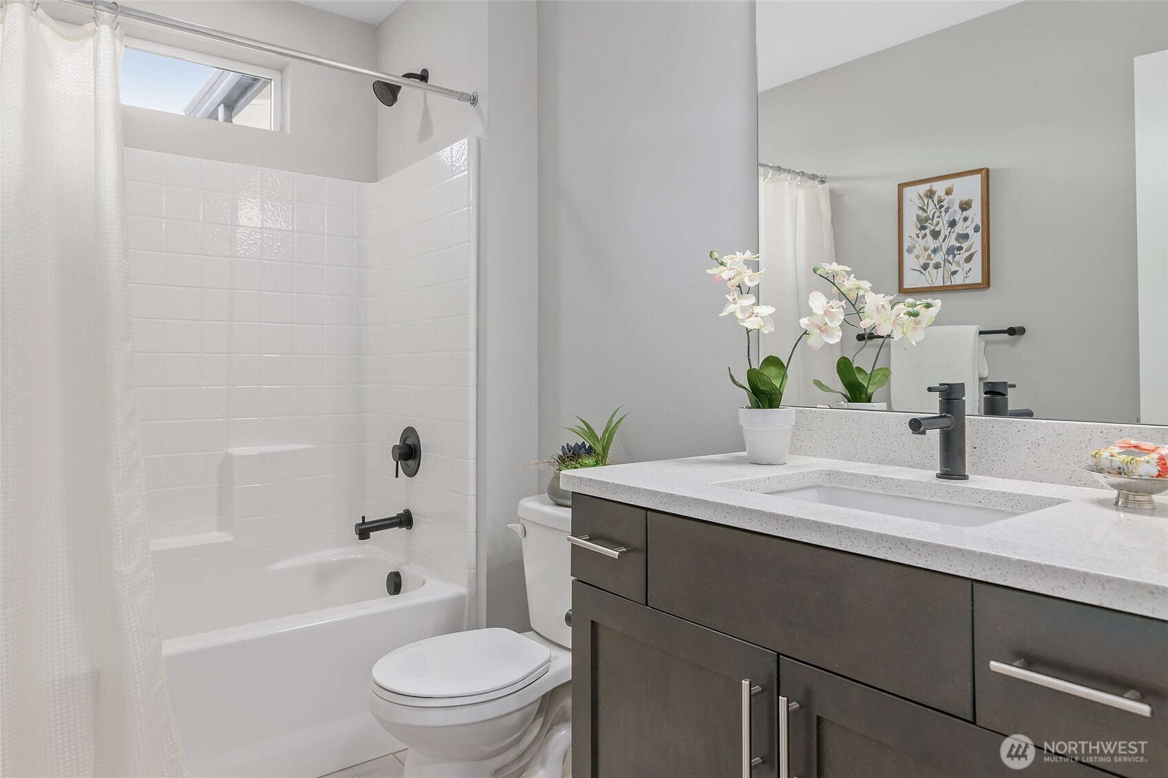 23630 6th Avenue Southeast, Unit B Bothell, WA 98021 - Photo 28 of 40 a bathroom with a granite countertop sink a toilet and shower