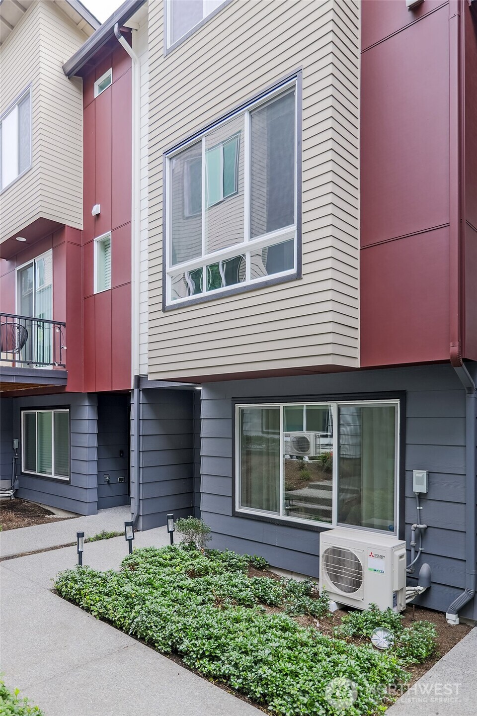 23630 6th Avenue Southeast, Unit B Bothell, WA 98021 - Photo 36 of 40 a front view of a house with garden