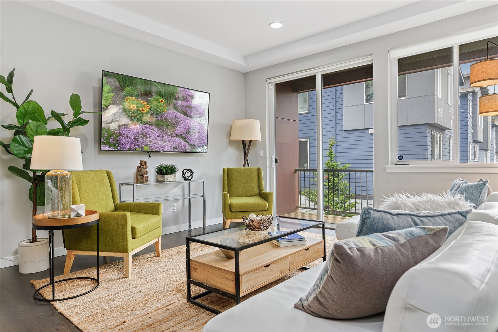 23630 6th Avenue Southeast, Unit B Bothell, WA 98021 - Photo 8 of 40 a living room with furniture and a flat screen tv