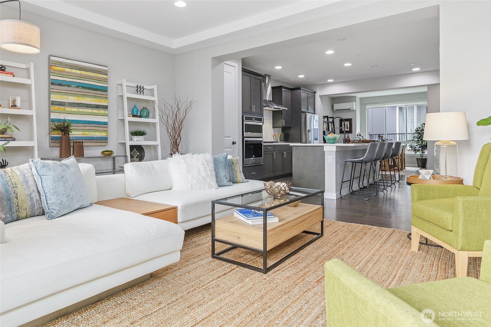 23630 6th Avenue Southeast, Unit B Bothell, WA 98021 - Photo 10 of 40 a living room with furniture and a wooden floor