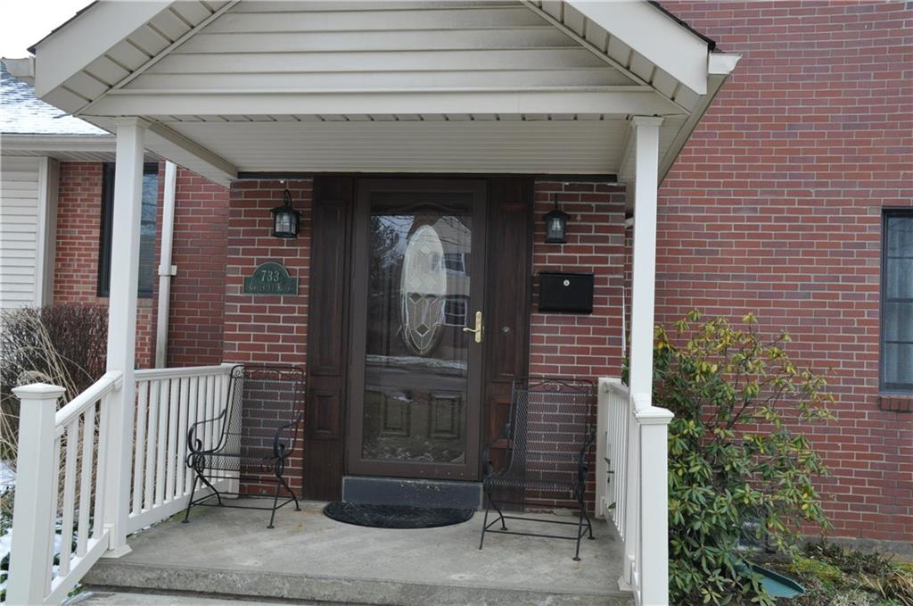733 Greenlee Road Pittsburgh, PA 15227 - Photo 2 of 21 A welcoming entrance with a newer sidewalk and front porch!