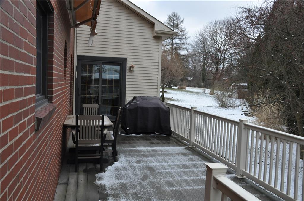 733 Greenlee Road Pittsburgh, PA 15227 - Photo 14 of 21 Just outside the family room and the den is the very low maintenance deck for summer time grilling and dining. Two sets of steps lead down to the yard if you want to let a pet outside quickly!
