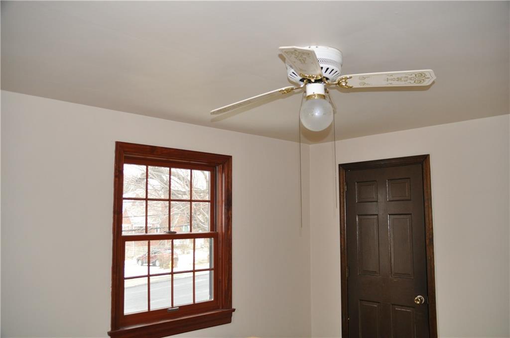 733 Greenlee Road Pittsburgh, PA 15227 - Photo 18 of 21 The second upstairs bedroom has been freshly painted and also has hardwood floors.