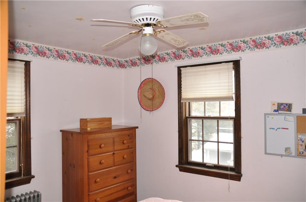 733 Greenlee Road Pittsburgh, PA 15227 - Photo 19 of 21 The third upstairs bedroom with hardwood floors underneath the carpeting.