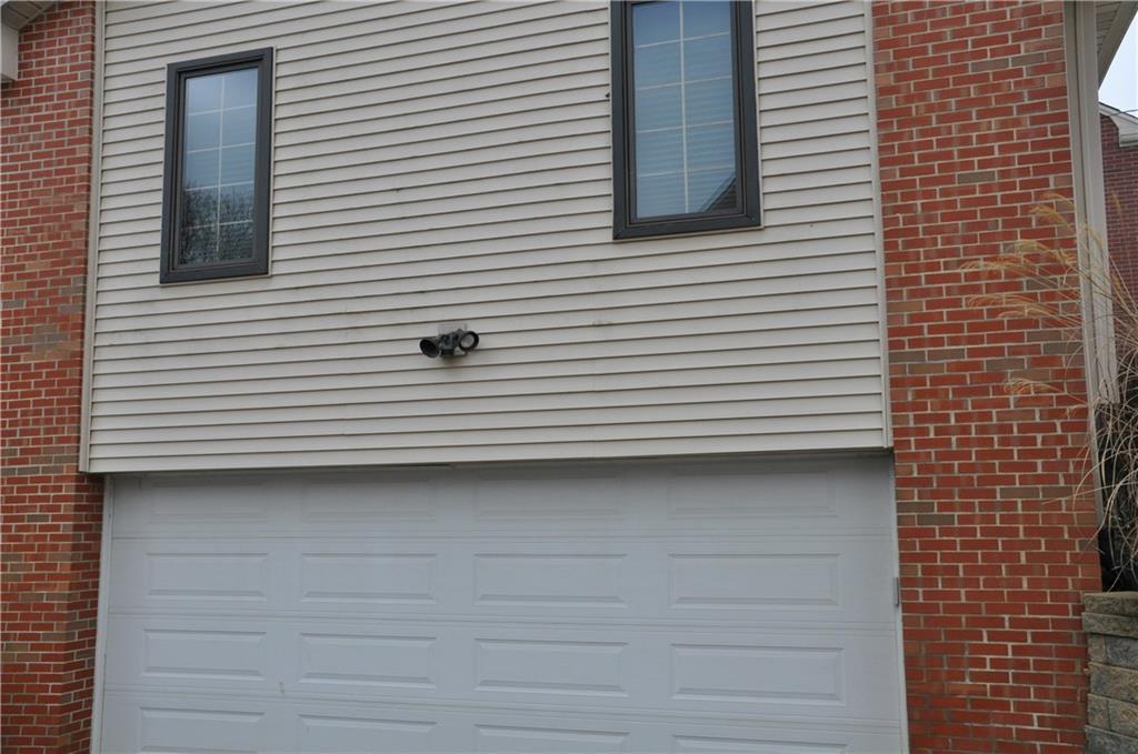 733 Greenlee Road Pittsburgh, PA 15227 - Photo 3 of 21 The deep 2 car garage (without an annoying post in the center) has extra storage space so you can fit both cars AND tools, toys, sports equipment, etc.