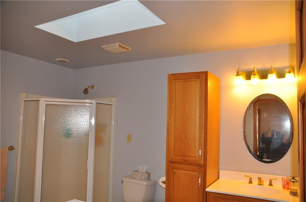 733 Greenlee Road Pittsburgh, PA 15227 - Photo 5 of 21 The master bath measures 11x9 and allows for natural lighting with the skylight.