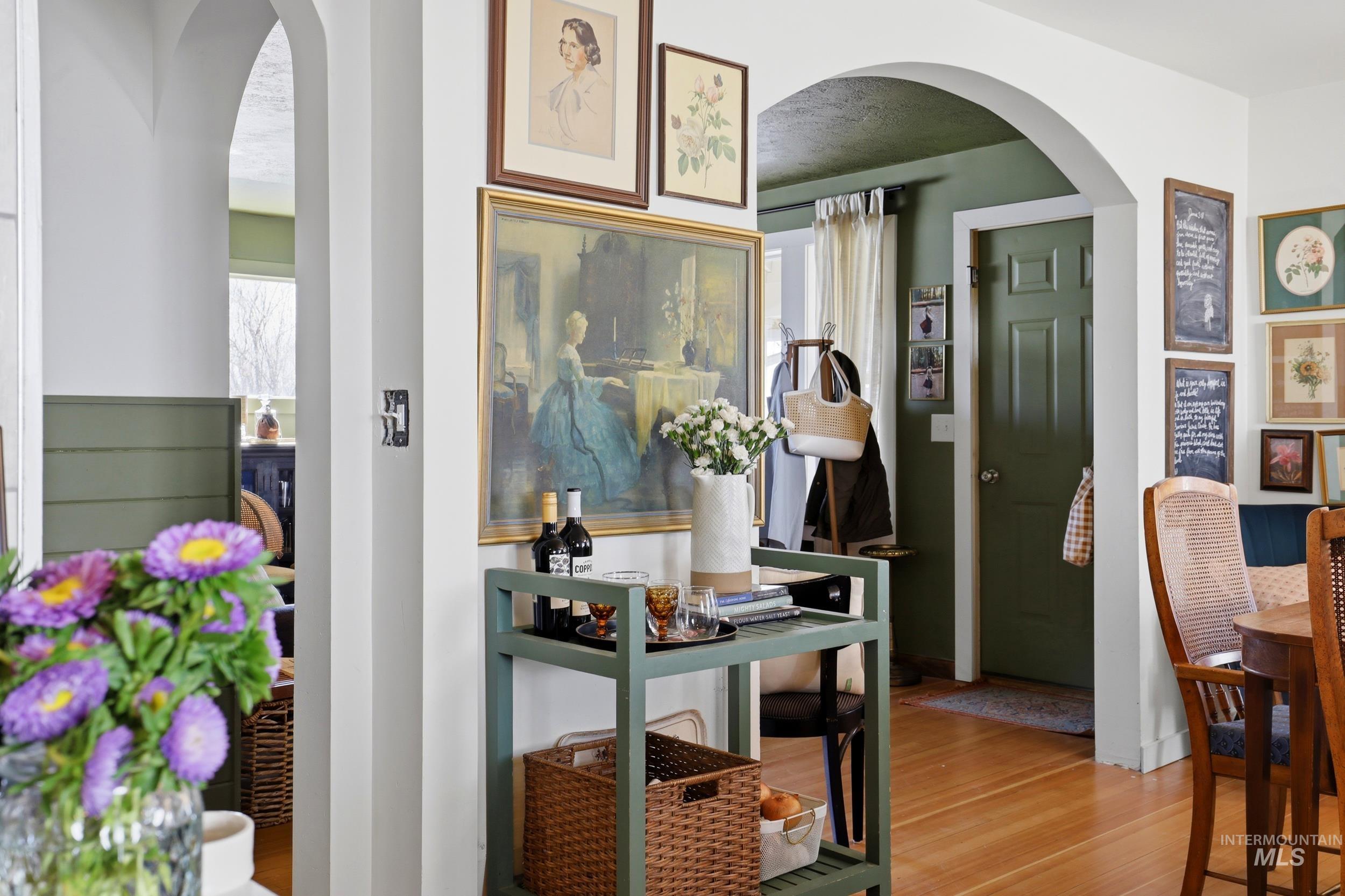 725 Elm Street Potlatch, ID 83855 - Photo 14 of 50 Corridor with arched walkways and light wood finished floors