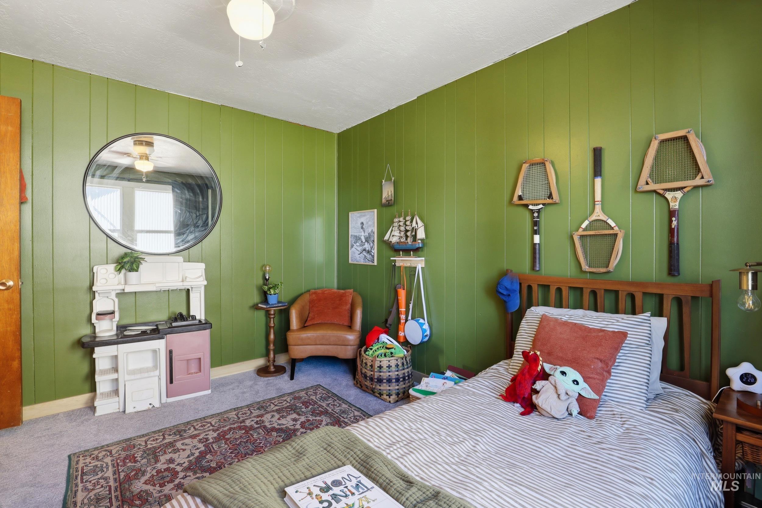 725 Elm Street Potlatch, ID 83855 - Photo 25 of 50 Carpeted bedroom featuring baseboards and a ceiling fan