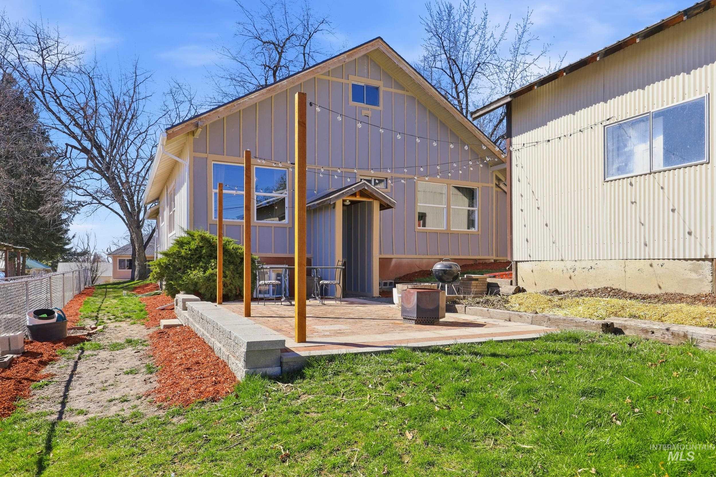 725 Elm Street Potlatch, ID 83855 - Photo 43 of 50 Back of property featuring board and batten siding and a patio