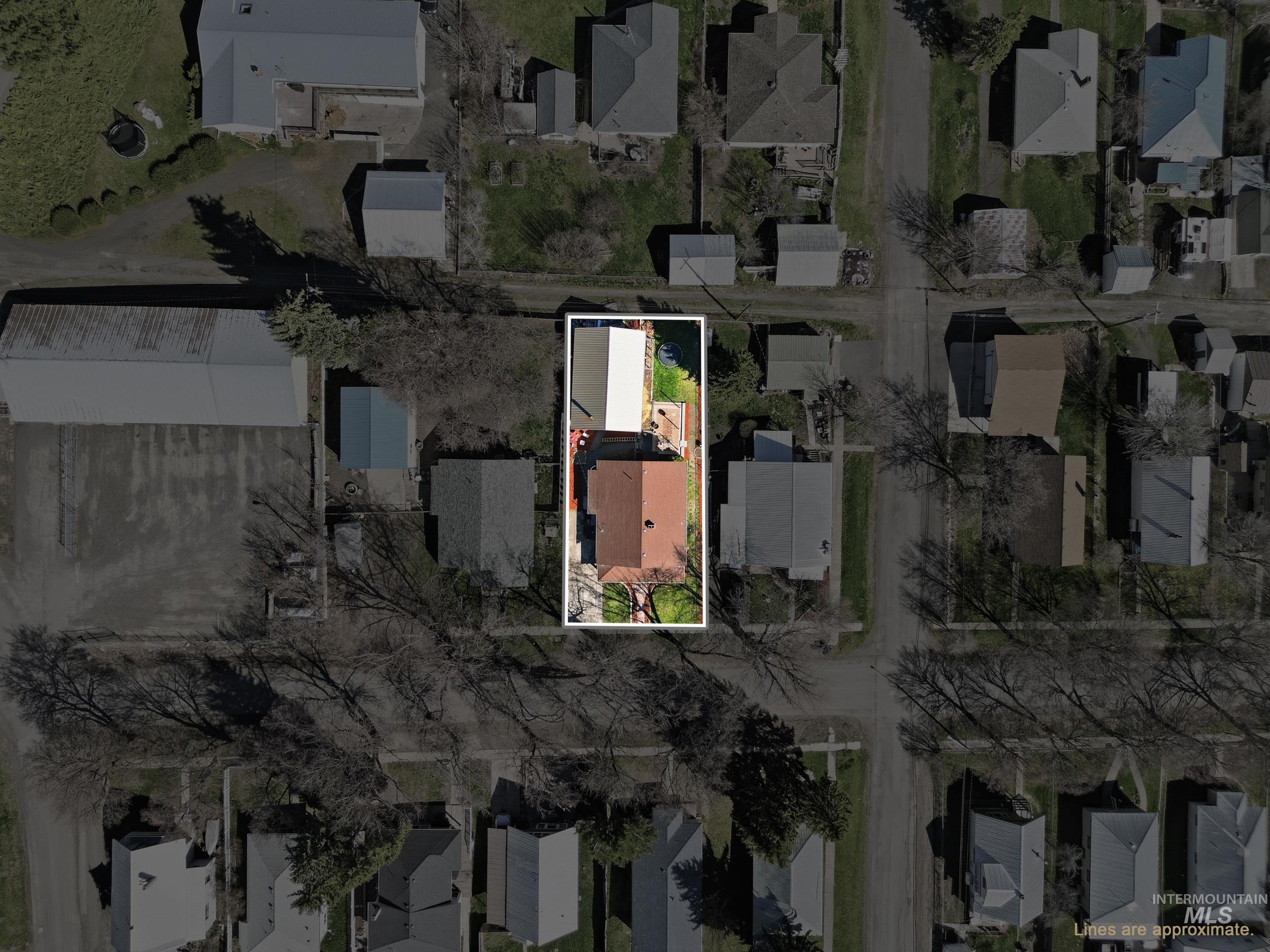 725 Elm Street Potlatch, ID 83855 - Photo 47 of 50 Aerial view of residential area with property parcel outlined