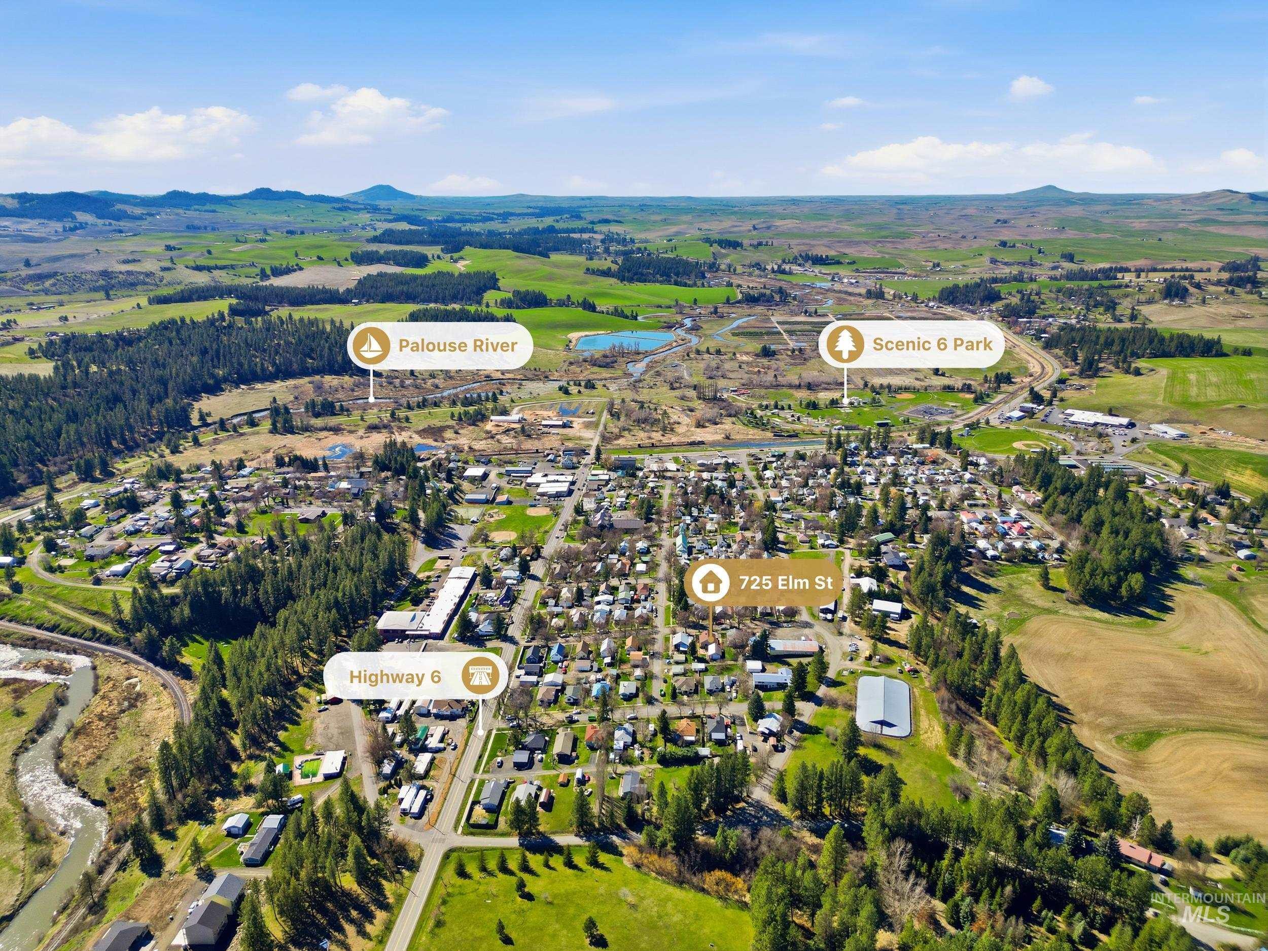 725 Elm Street Potlatch, ID 83855 - Photo 49 of 50 Aerial perspective of suburban area featuring a water and mountain view